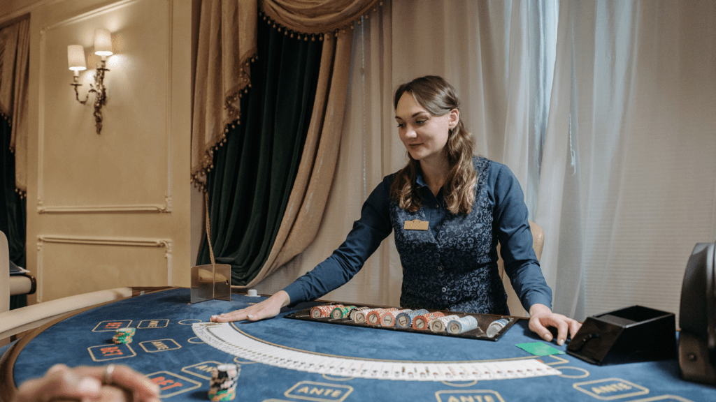 A person playing blackjack at the table