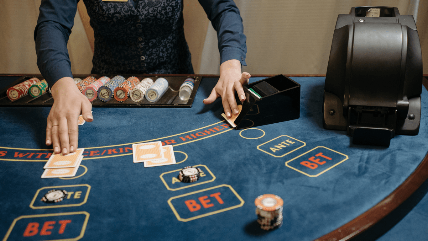 A person playing blackjack at the table