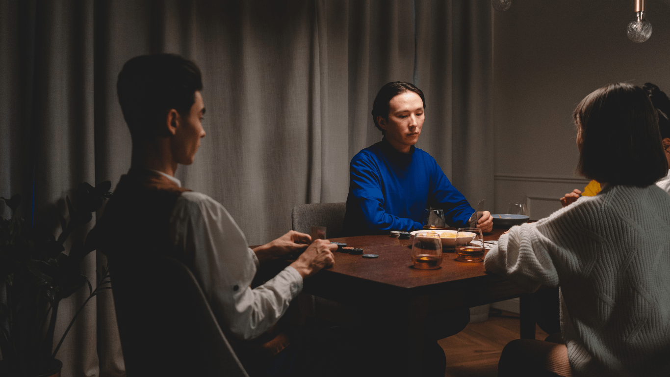 a person playing poker at the table