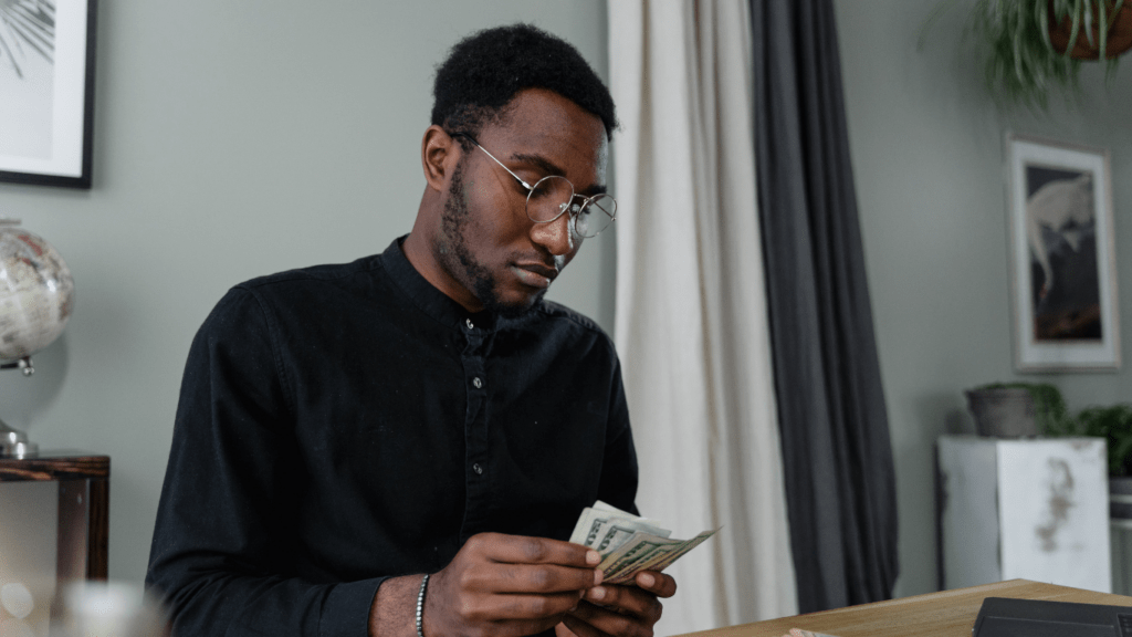 a person counting a money