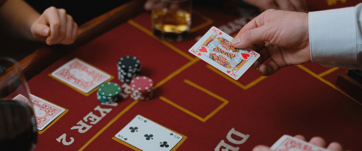 a person sitting on the poker table